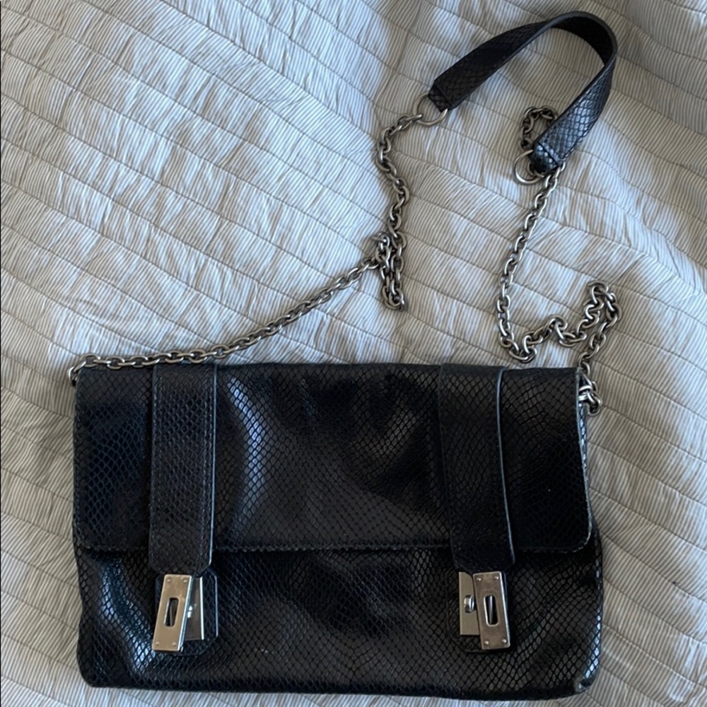Folley and Corinna black faux clutch purse!